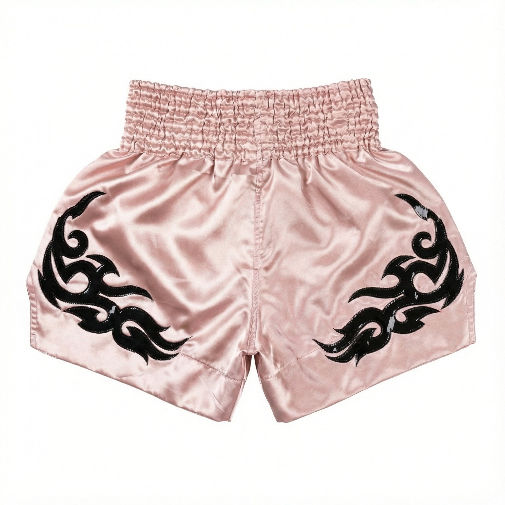 Pink shorts with black tribal designs on a white background