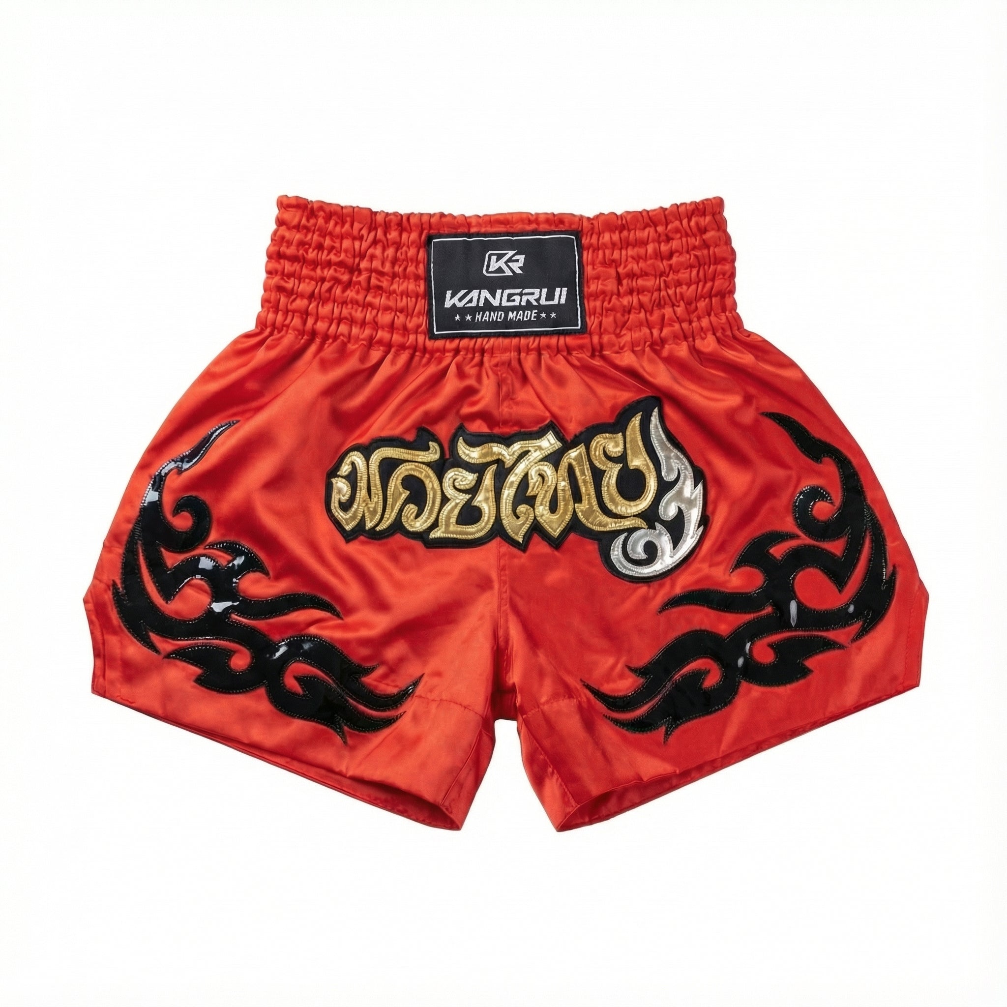 Red boxing shorts with black tribal designs and a Kangrui logo on a white background