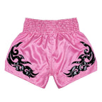 Pink shorts with black tribal designs on a white background
