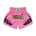 Pink boxing shorts with black designs and a visible brand label on a white background
