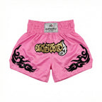 Pink boxing shorts with black designs and a visible brand label on a white background