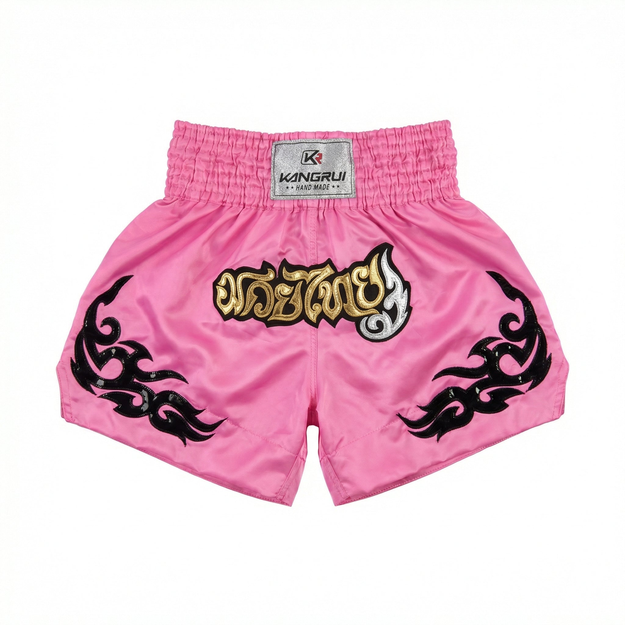 Pink boxing shorts with black designs and a visible brand label on a white background