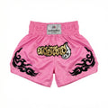 Pink boxing shorts with black designs and a visible brand label on a white background