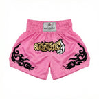 Pink boxing shorts with black designs and a visible brand label on a white background