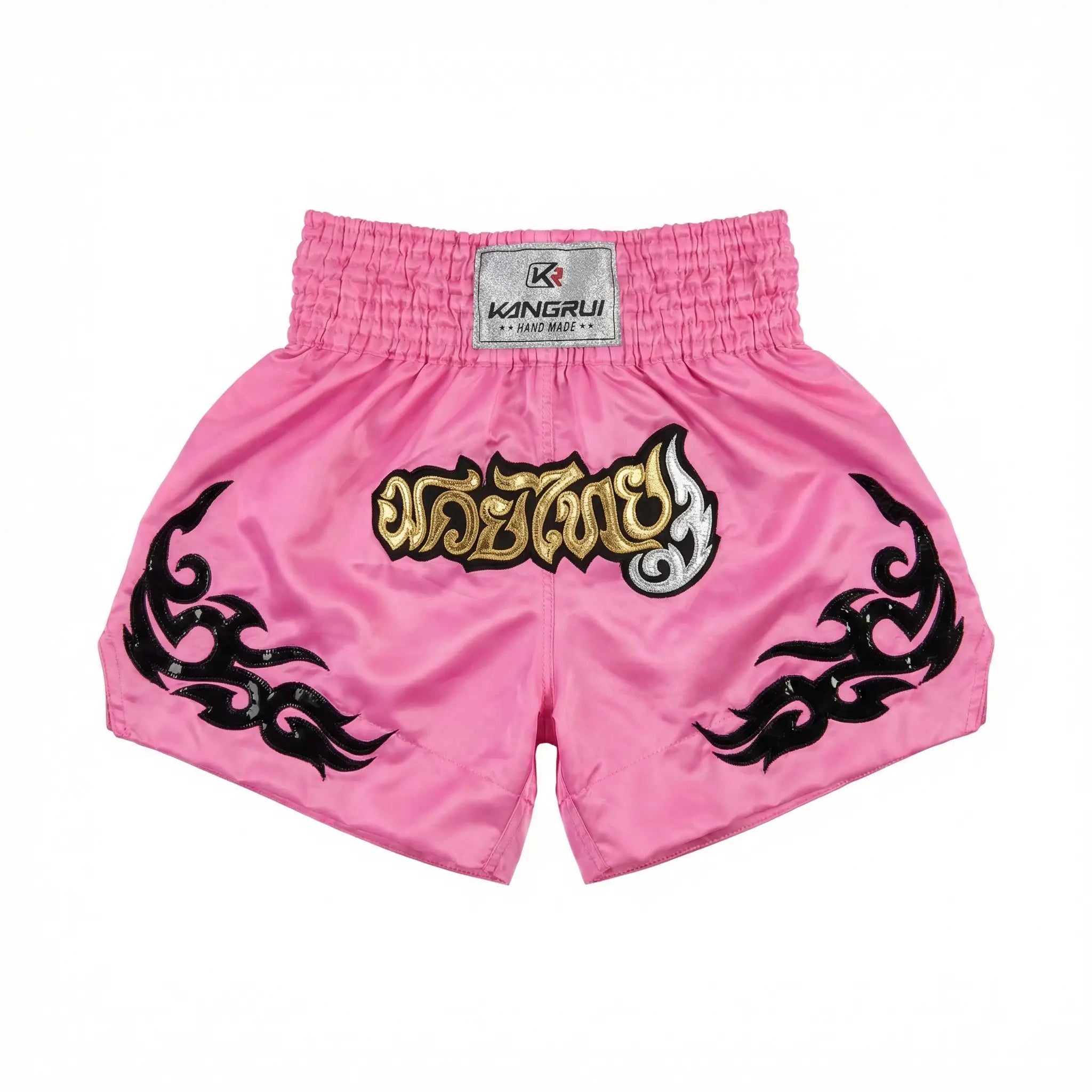 Pink boxing shorts with black designs and a visible brand label on a white background